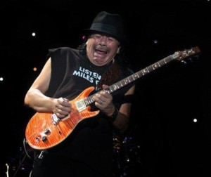 Classic face expression of superstar guitar player, Carlos Santana